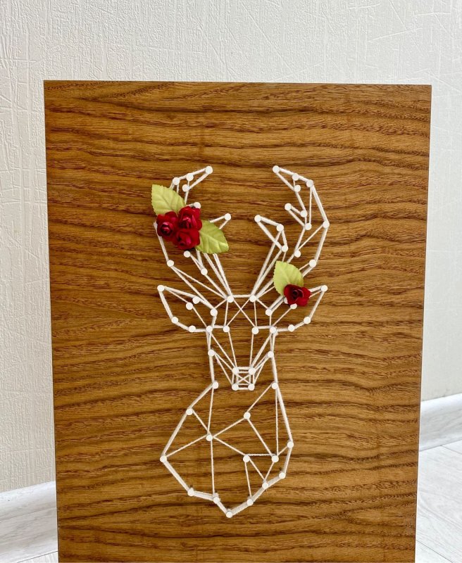 Олень нитками и гвоздями