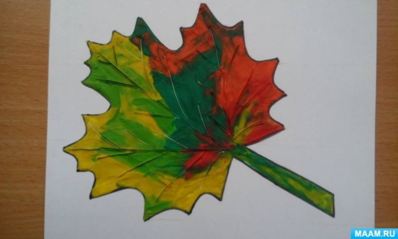 Кленовый лист из пластилина на картоне