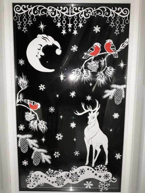 Новогодние рисунки на окнах
