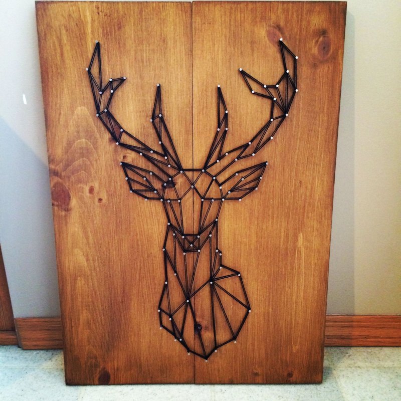 Олень из дерева