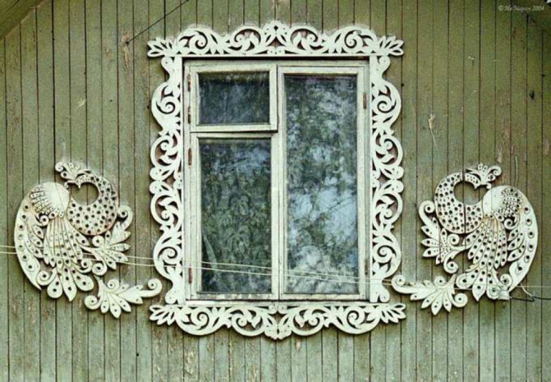 Прорезная домовая резьба наличники