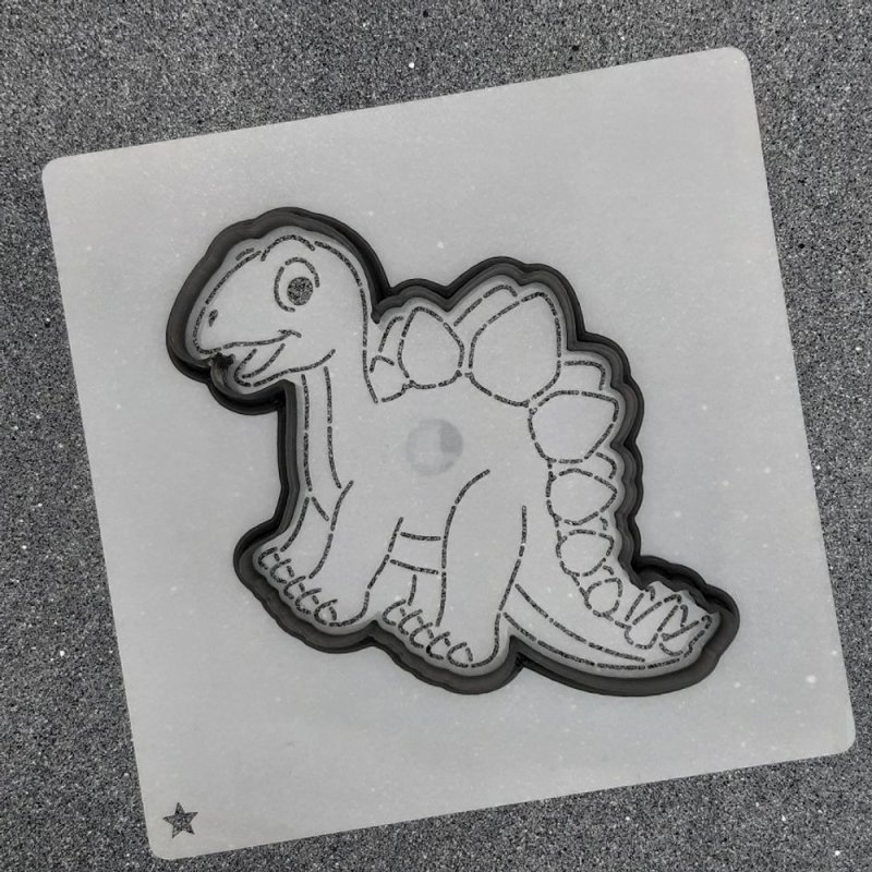 Пряник в форме динозавра