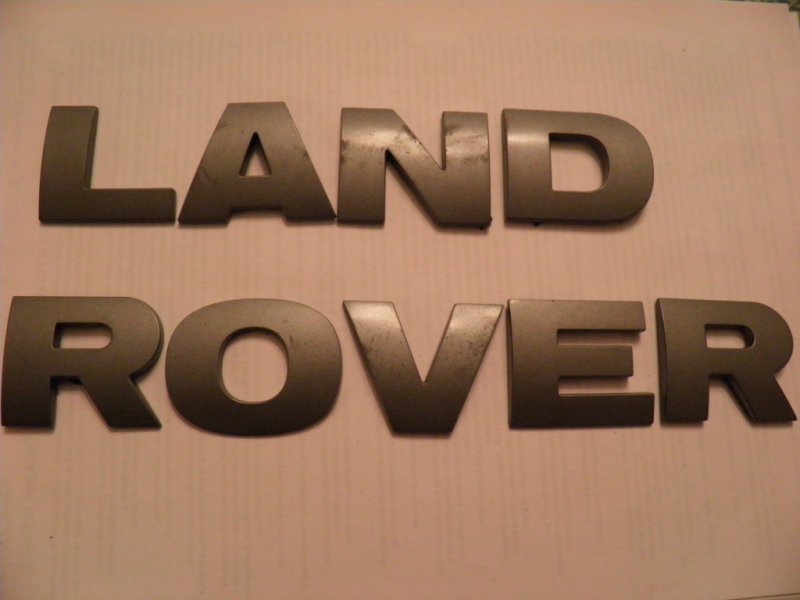 Черные буквы range Rover