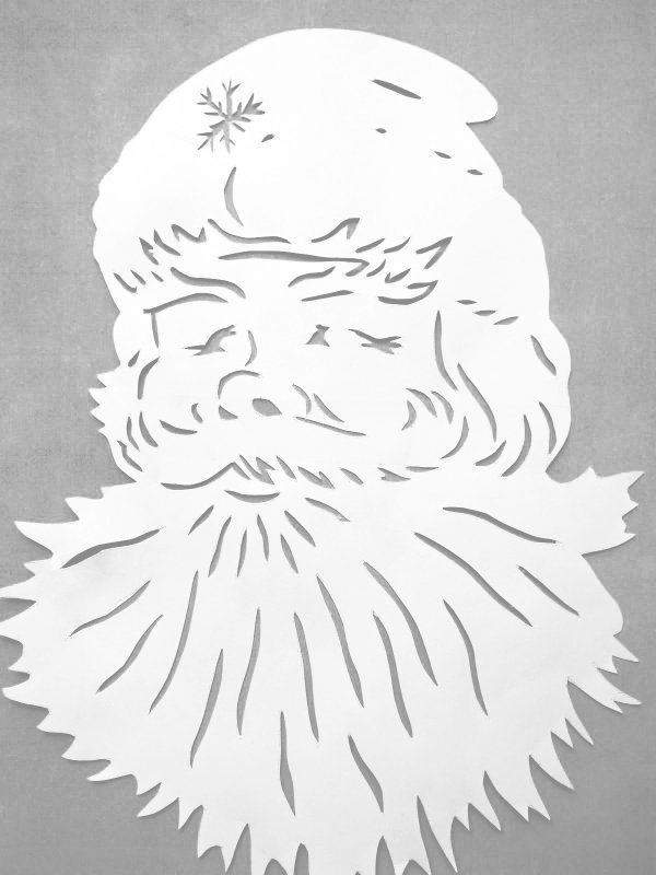 Вытынанка голова Деда Мороза на окно