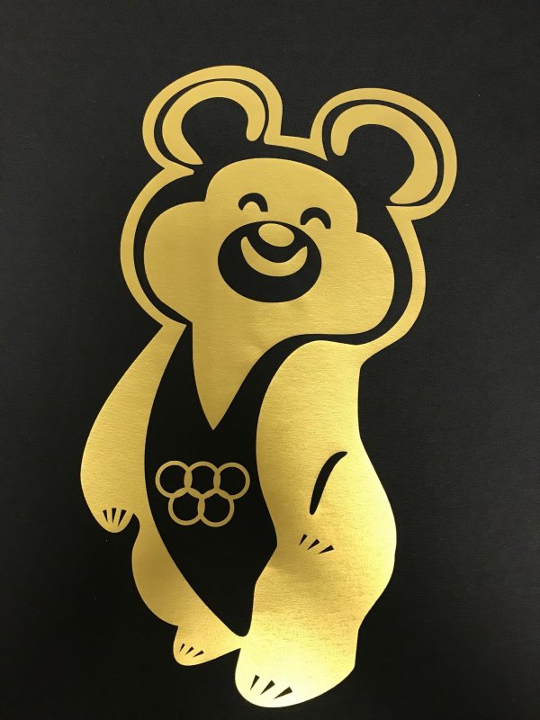 Золотой Олимпийский мишка