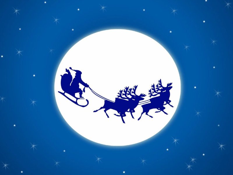 Санта на санях на фоне Луны