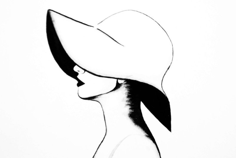 Женщина в шляпе в профиль