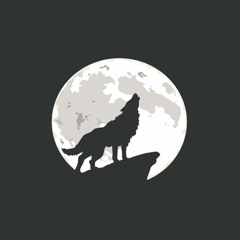 Силуэт волка воющего на луну