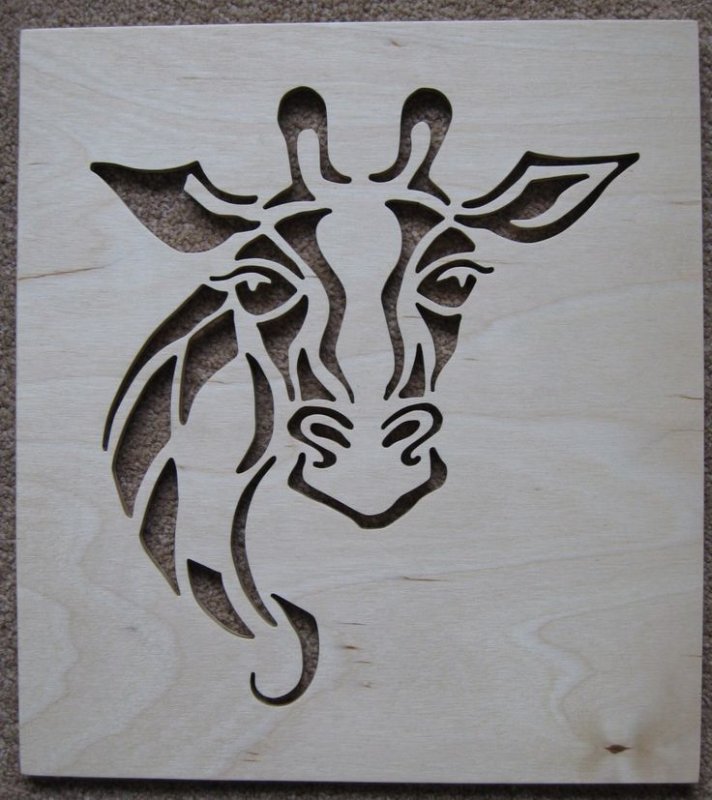 Прорезная резьба по дереву животные