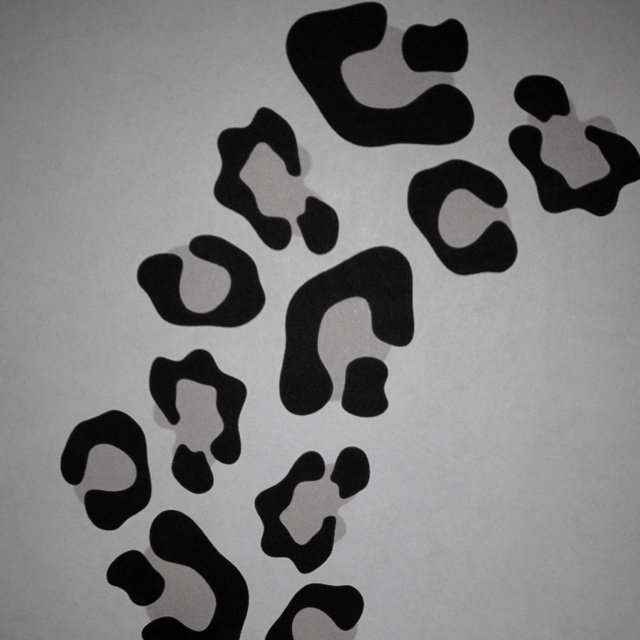 Тату леопардовые пятна