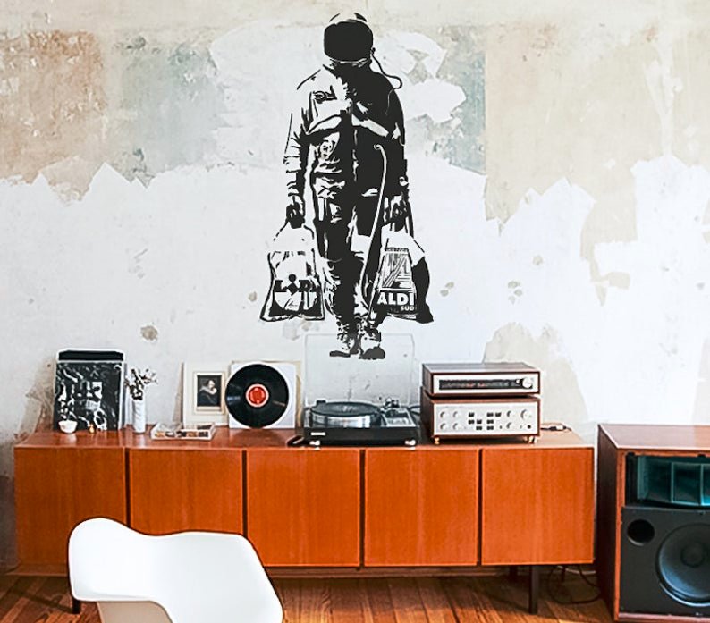 Banksy космонавт