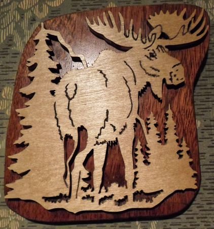 Резьба по дереву лобзиком интарсия