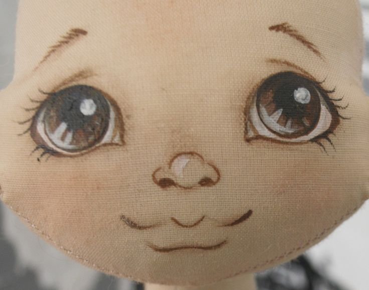 Текстильная кукла с нарисованным лицом