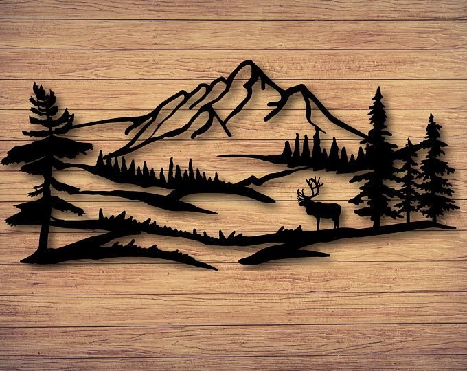 Горы вырезанные на дереве