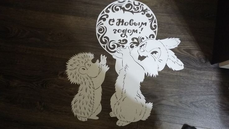 Трафаретные зайчики на окне