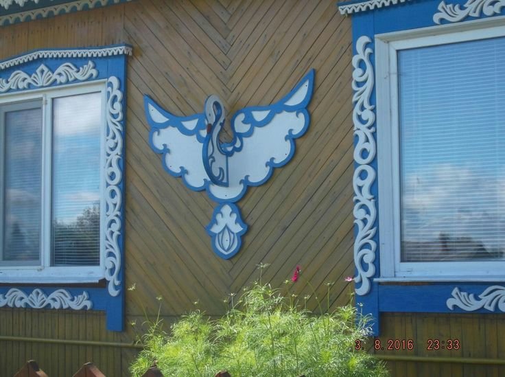 Петух на наличниках