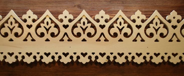 Прорезная домовая резьба наличники