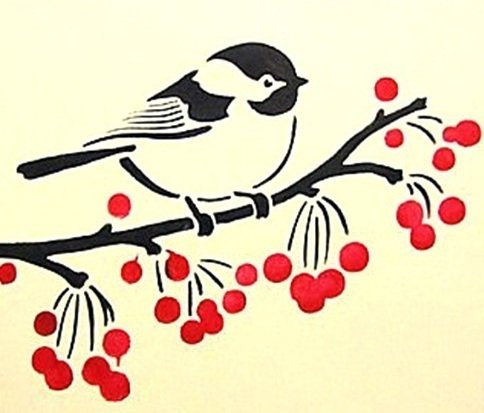 Вытанка птица на ветке зимой