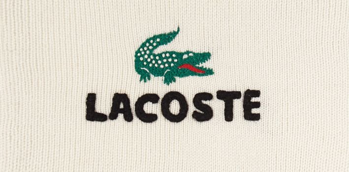 Lacoste бренд логотип
