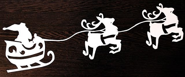 Сани с оленями украшение на окно