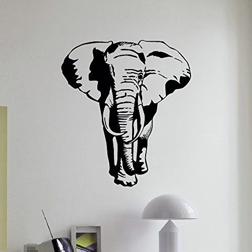 Слон на стене в интерьере