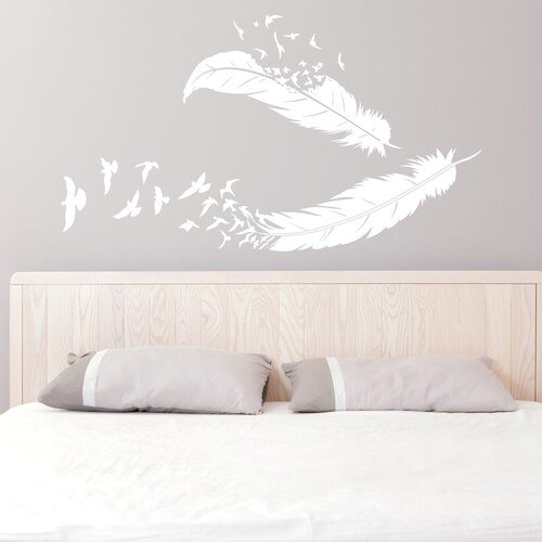 Перья на стене