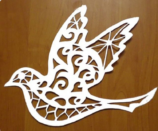 Ажурное вырезание птицы