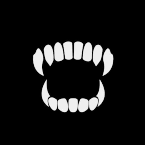 Острые зубы на чёрном фоне